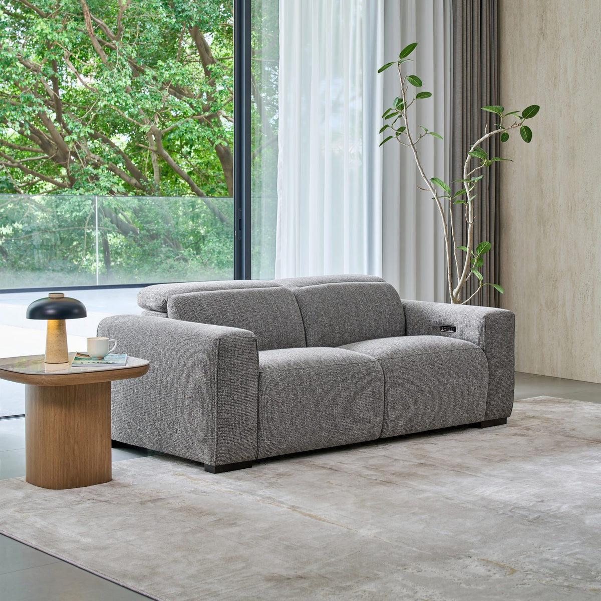 Jeddah 2 seat recliner sofa in grey fabric, angle view