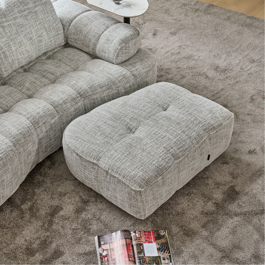 Embrace Footstool shown in FA-MEGA-06 fabric