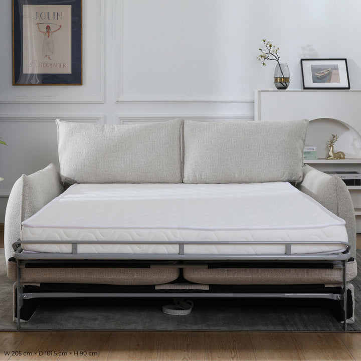 Franka Sofa Bed converted into a double bed, front view with the mattress extended in a living room