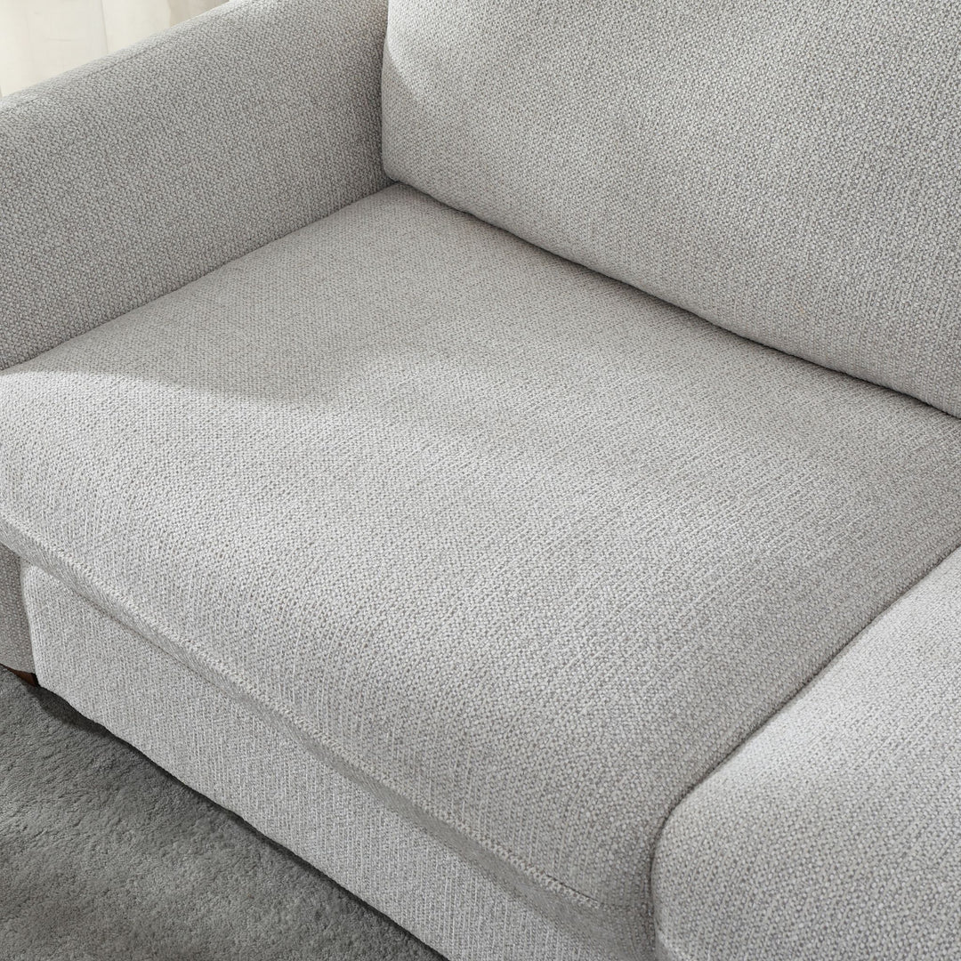 Close-up of the Franka Sofa Bed's deep seat cushion in light grey woven fabric