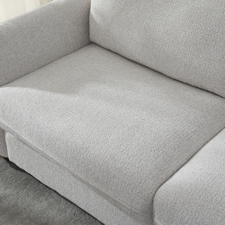 Close-up of the Franka Sofa Bed's deep seat cushion in light grey woven fabric