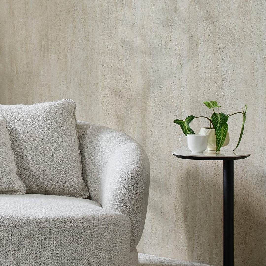 Ava Side Table beside an ivory bouclé swivel chair