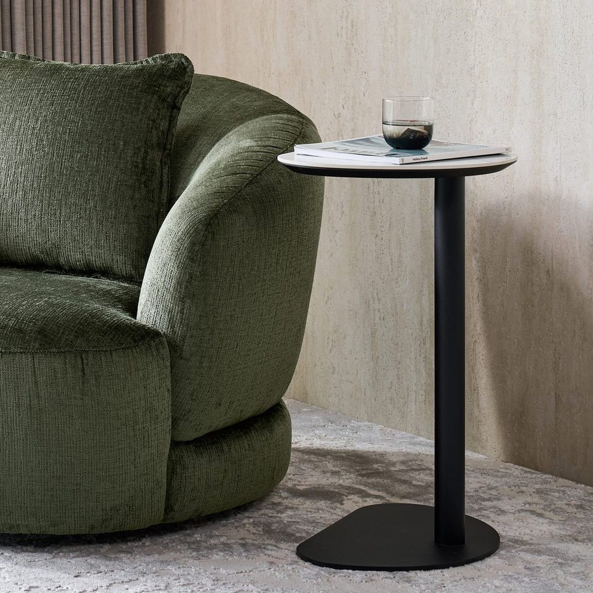 Ava Side Table beside an olive green swivel chair
