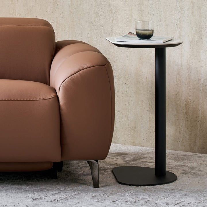 Ava Side Table beside a tan leather recliner armchair