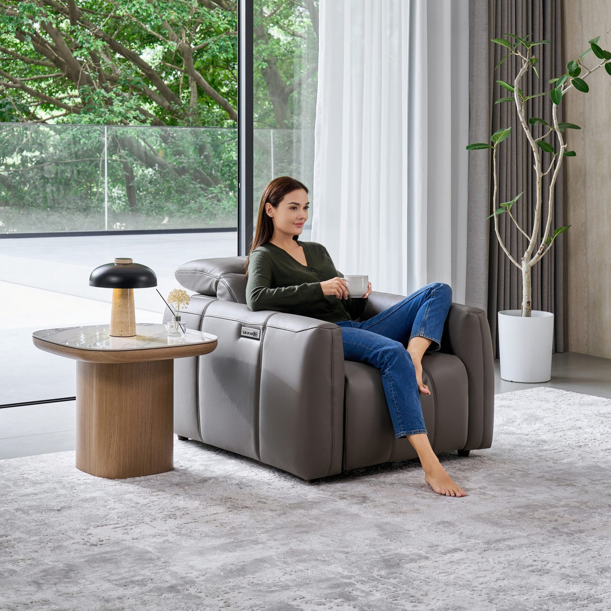 Woman relaxing in the Bailey 1 Seat Armchair