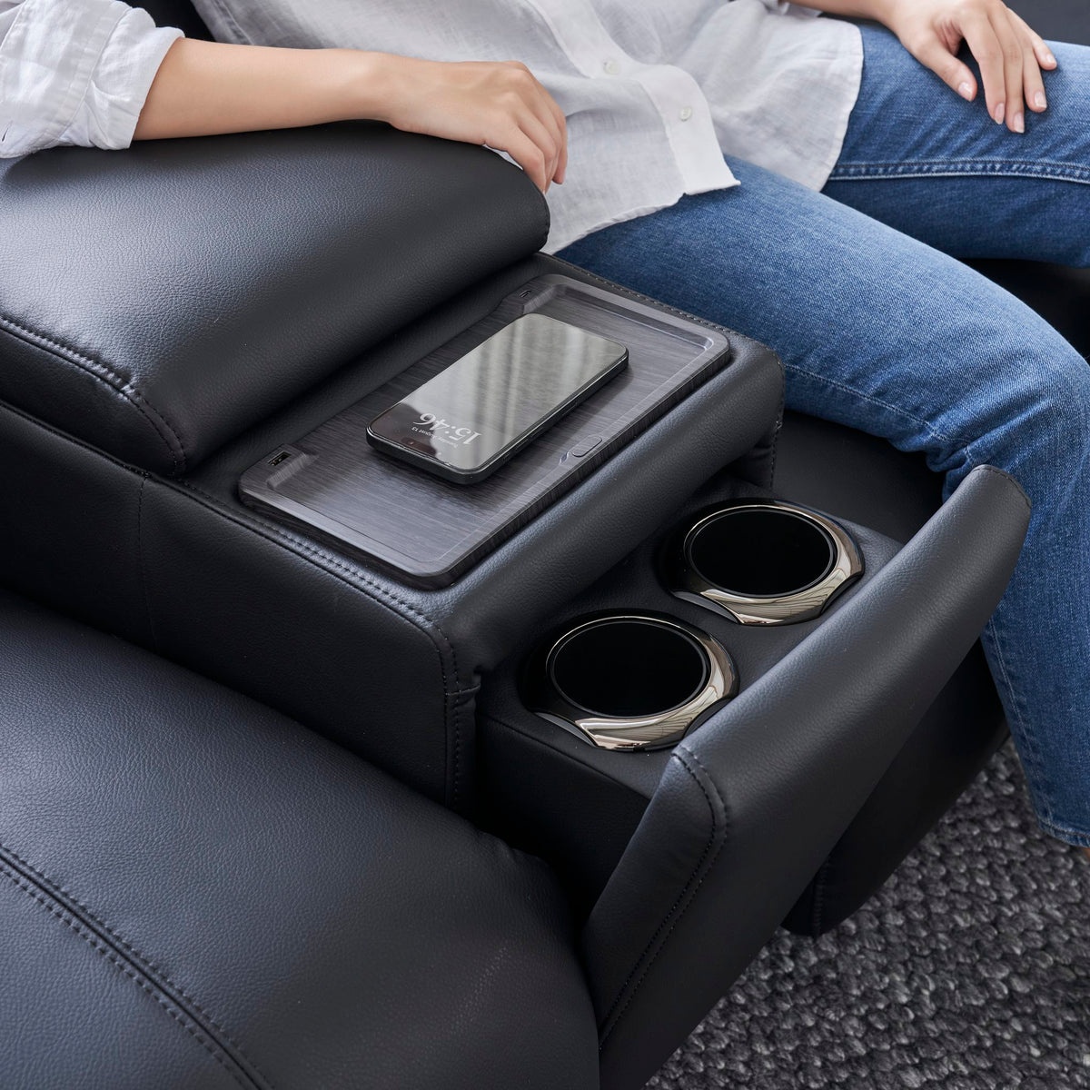 Bailey Home Theatre Sofa console with cup holders and a phone tray