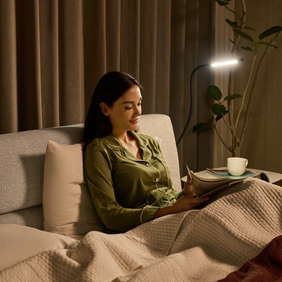 Reading in bed at night against the Brooklyn headboard