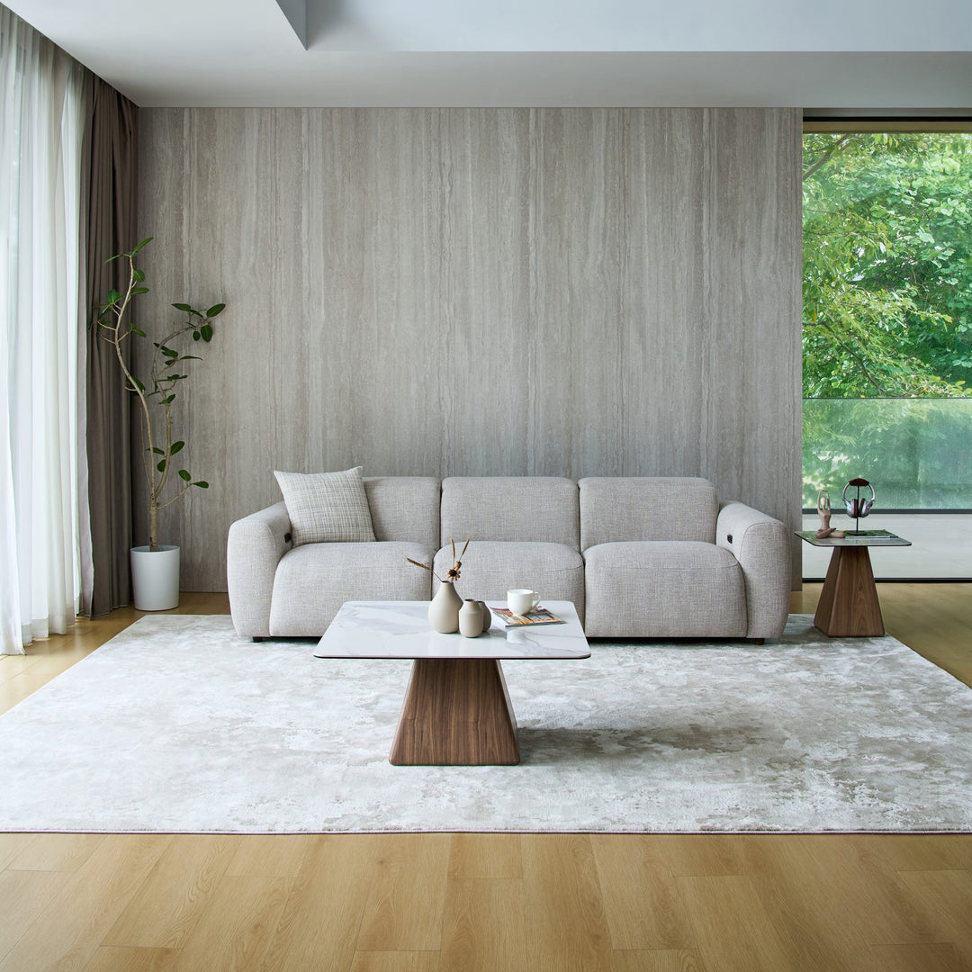 Cambridge 3 seat recliner sofa in light grey fabric in a living room