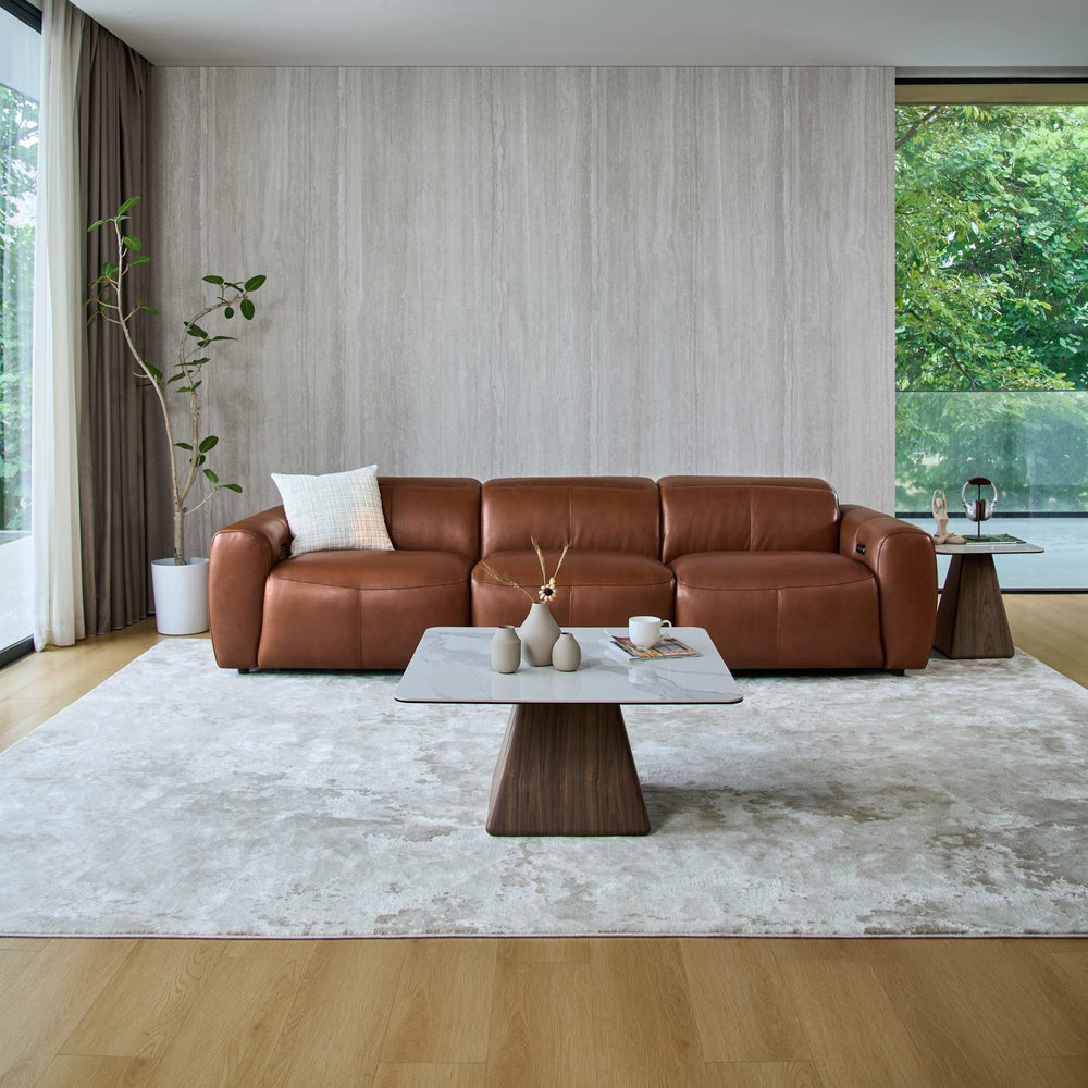 Cambridge 3 seat recliner sofa in tan leather in a living room