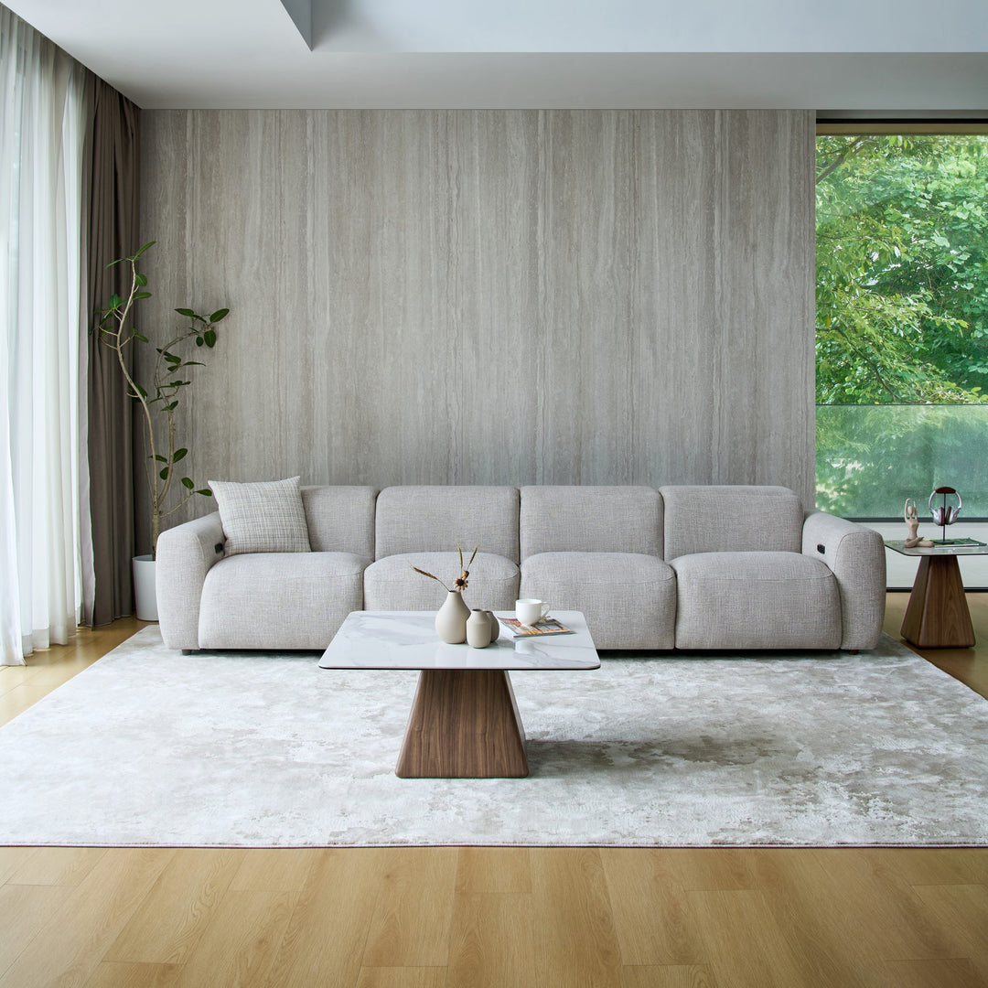 Cambridge 4 seat recliner sofa in light grey fabric in a living room