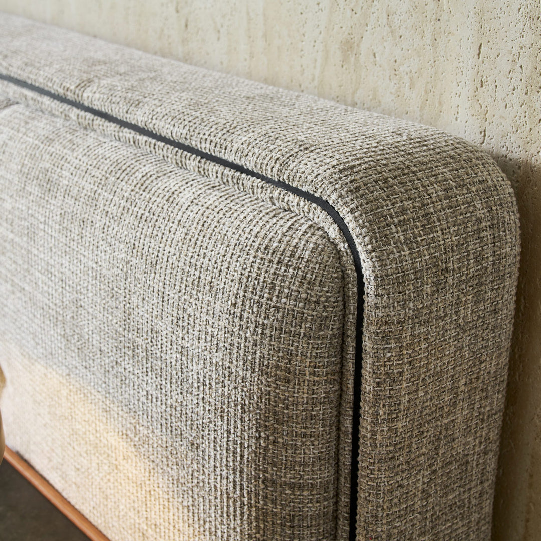 Close-up of the FB-SANTI-130 fabric and black trim on the Clara Bed headboard