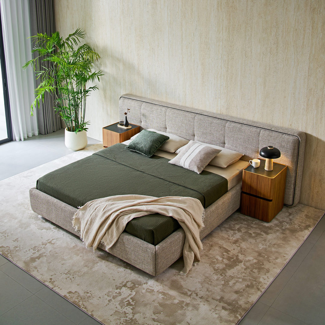 Clara Bed seen from above at an angle, showing the upholstered base and headboard