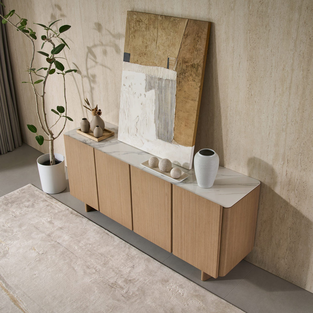 Iris Buffet in Boston Oak veneer with a Bianco ceramic stone top, side angle view