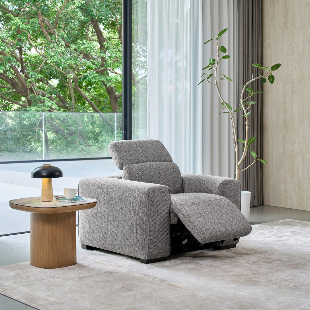 Jeddah recliner armchair in grey fabric, reclined with the headrest raised