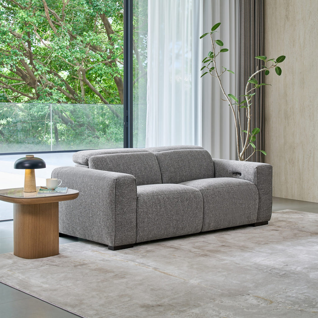 Jeddah 2 seat recliner sofa in grey fabric, angle view