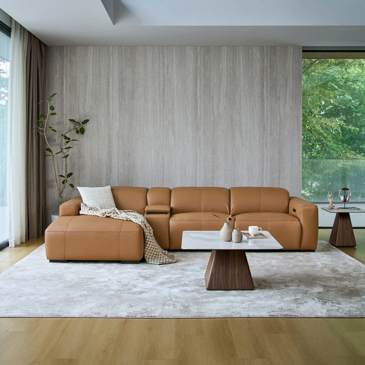 Jeddah chaise sofa in tan leather with a media console, front view