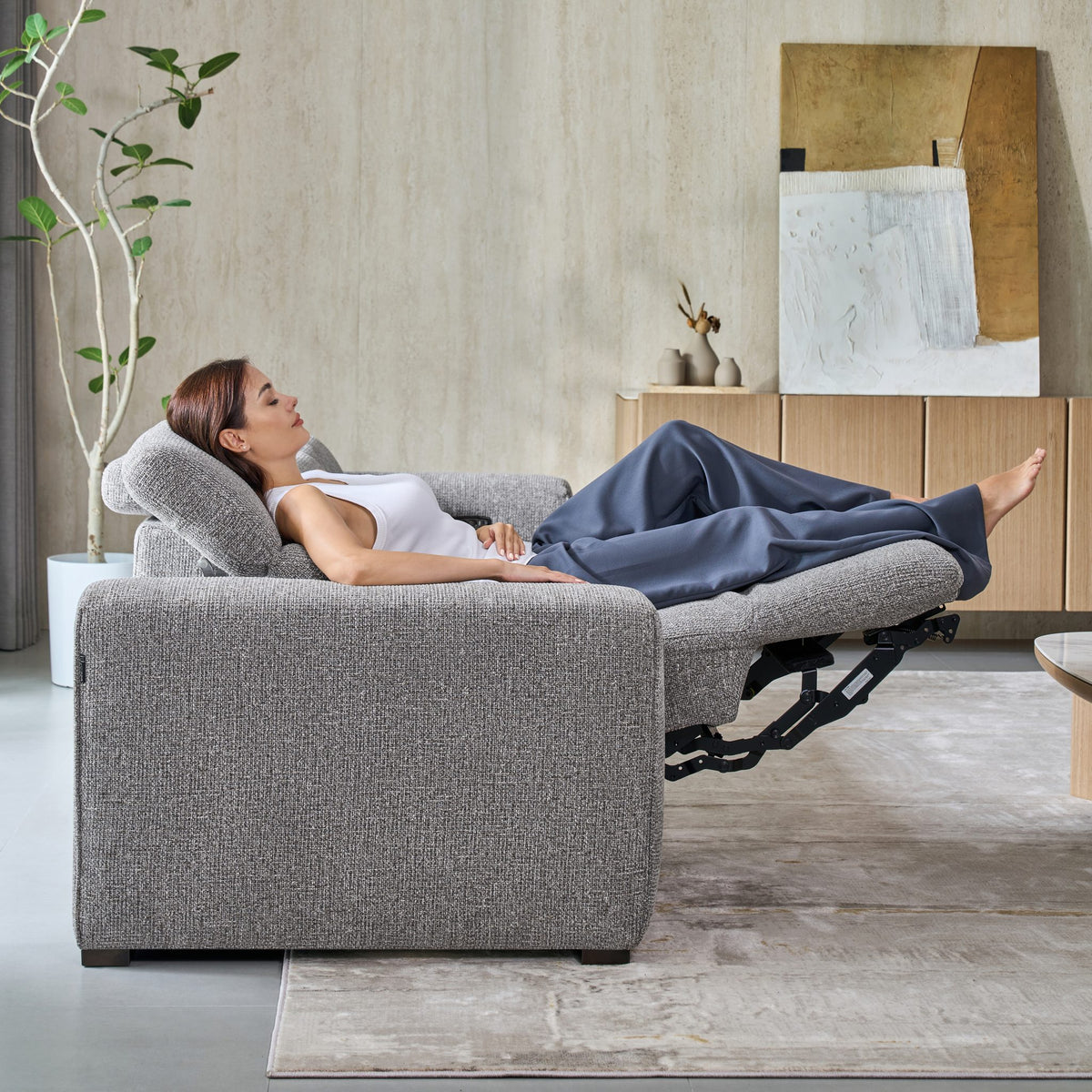 Side view of a fully reclined Jeddah seat in grey fabric