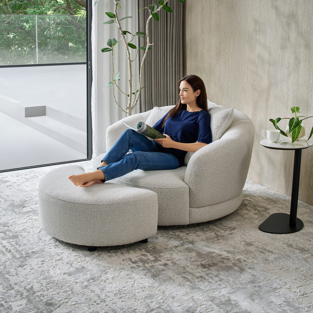 Ava Side Table beside the Narla Swivel Chair and footstool