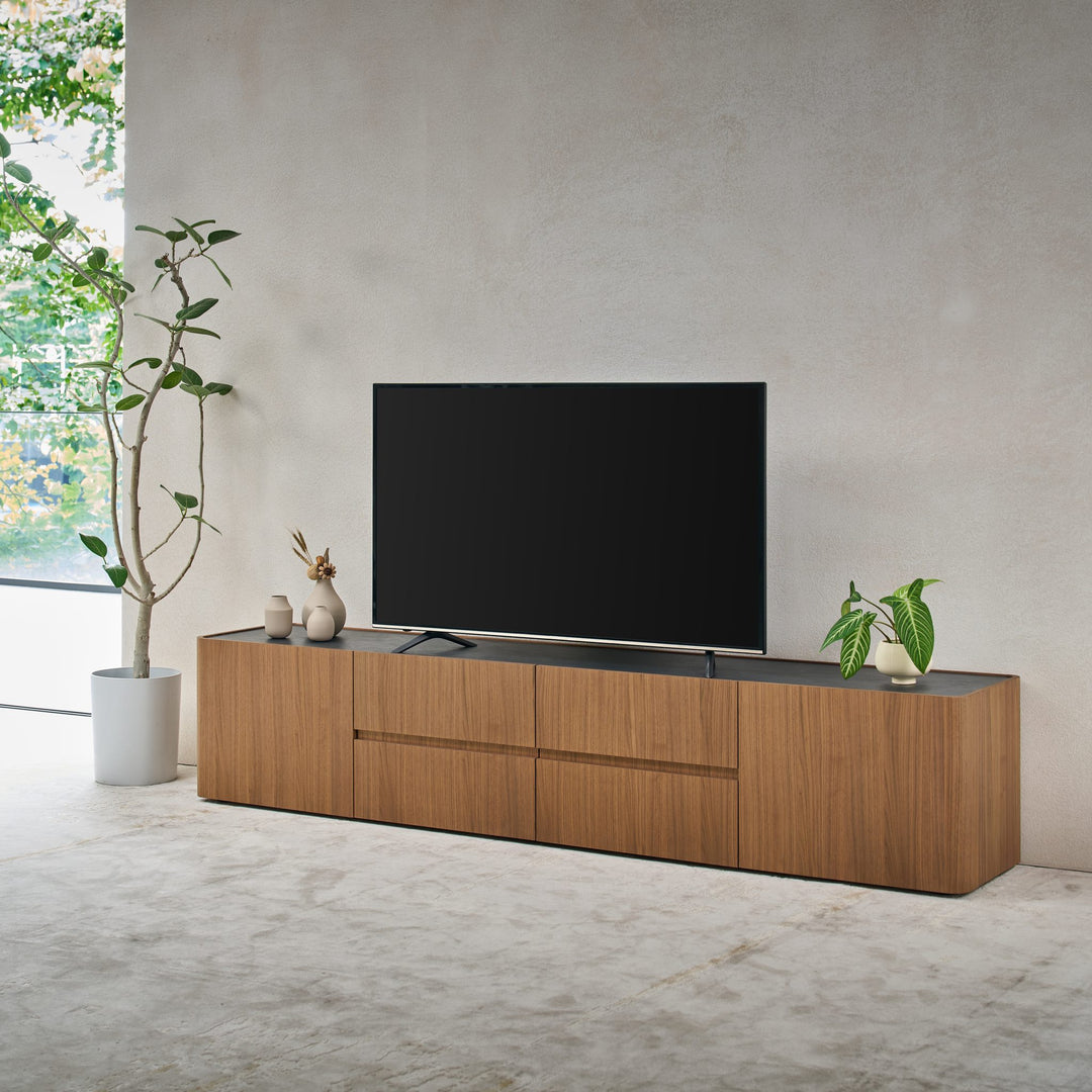 Persia TV Unit in American Walnut with a Vixon ceramic stone top, angled view
