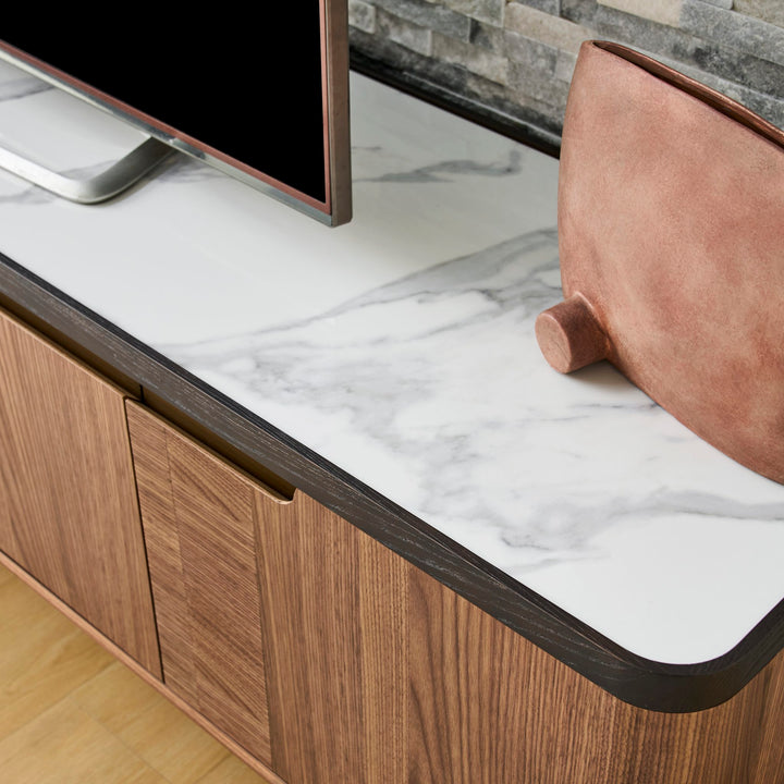 Close-up of the Rowan TV Unit Bianco ceramic stone top with Black Oak edge